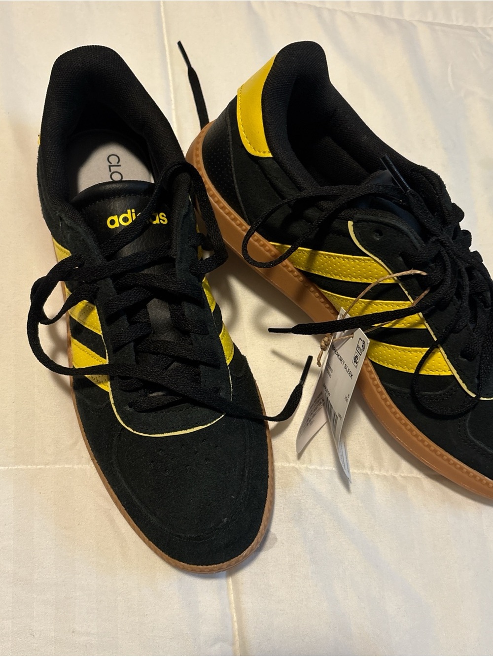 adidas women’s Black & Yellow Low-Top Sneakers with Gum Sole